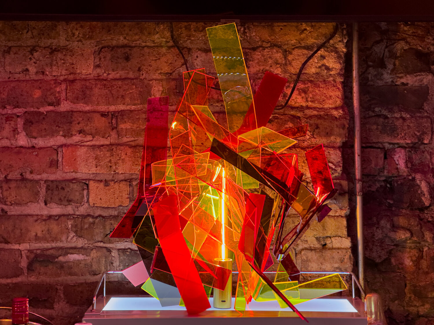 Flame Core, translucent and fluorescent acrylic sculpture with found light